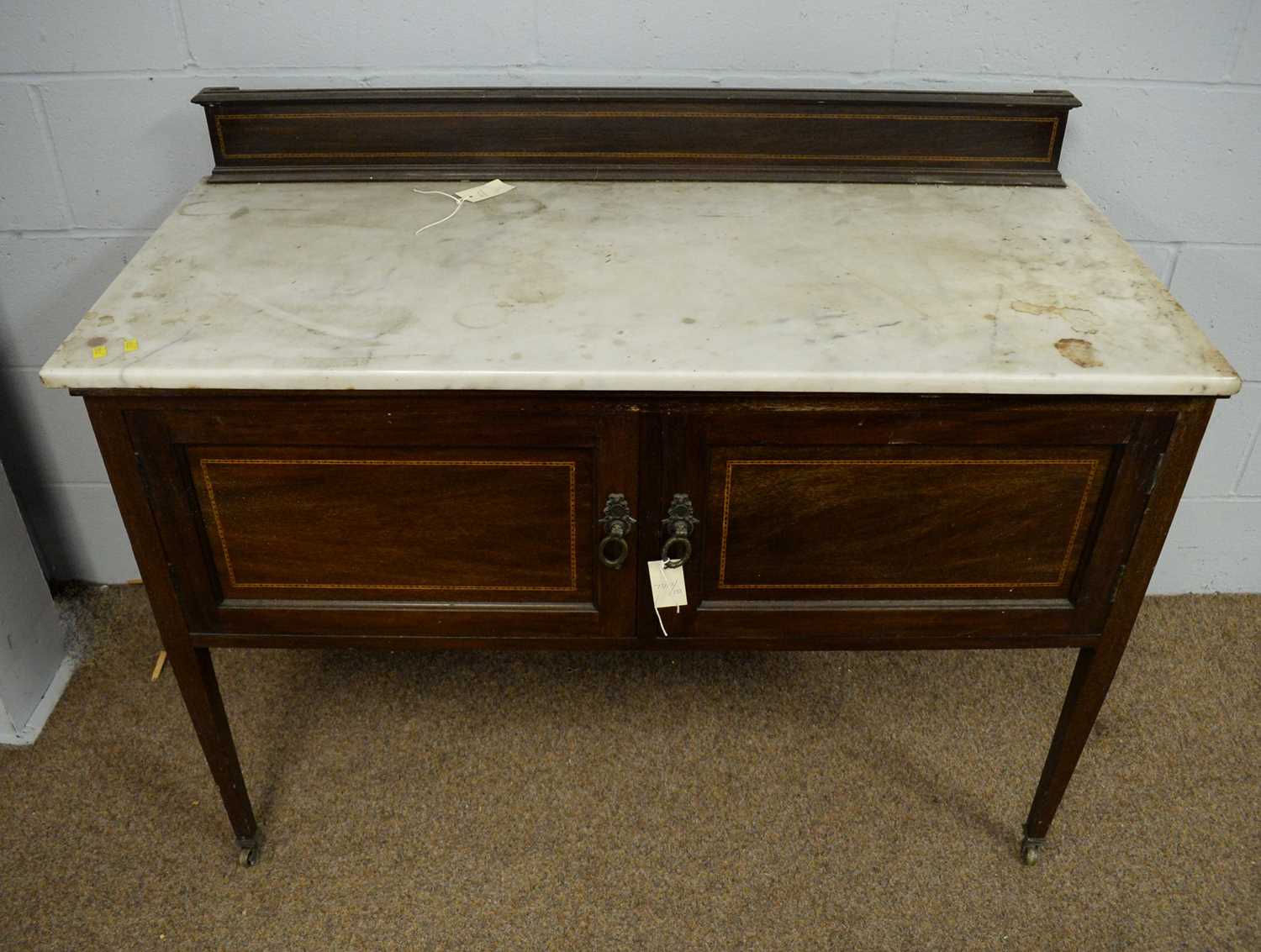 An Edwardian mahogany washstand.