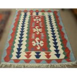 A Kilim flat woven rug.