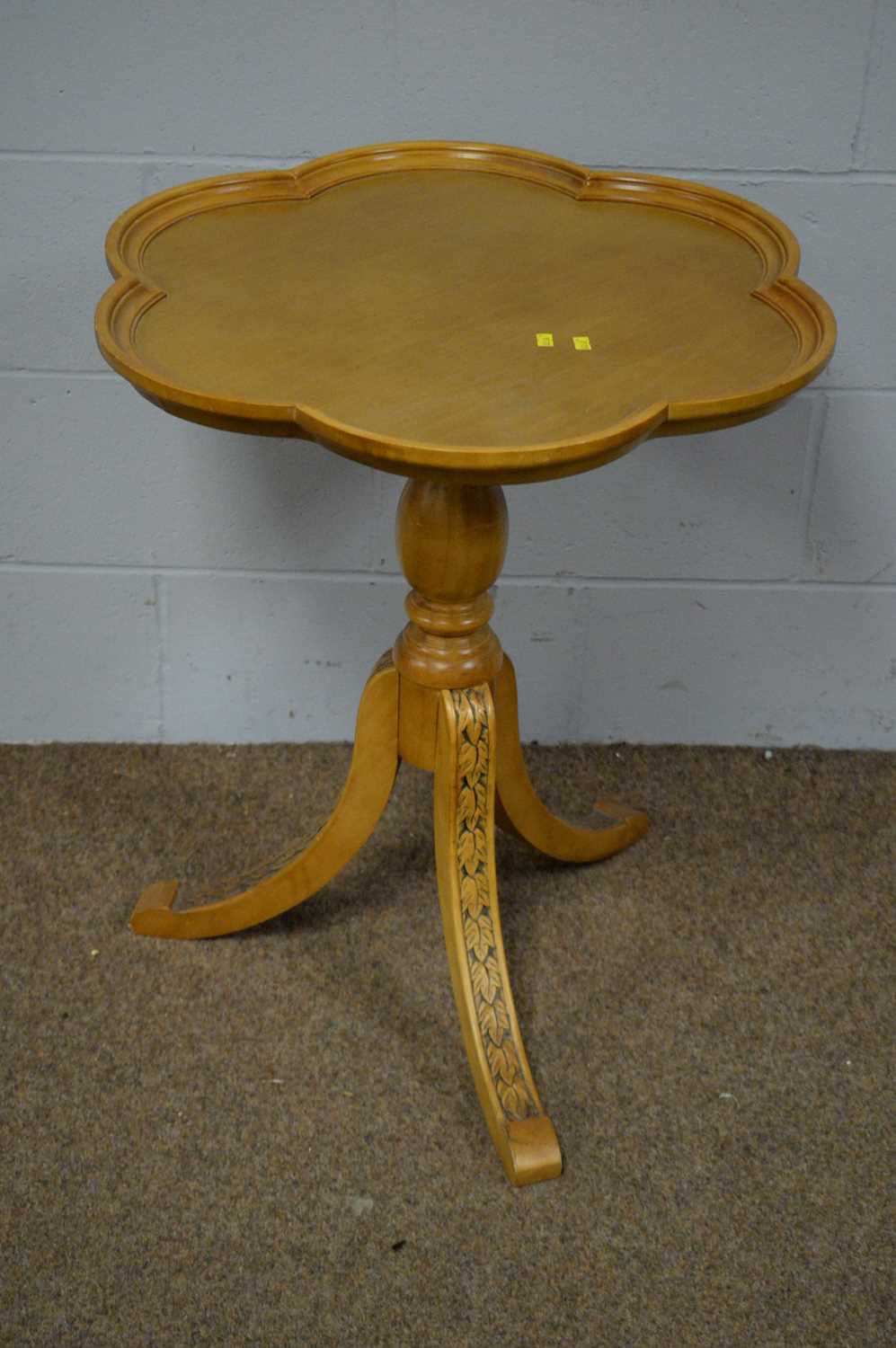 A modern decorative tripod table