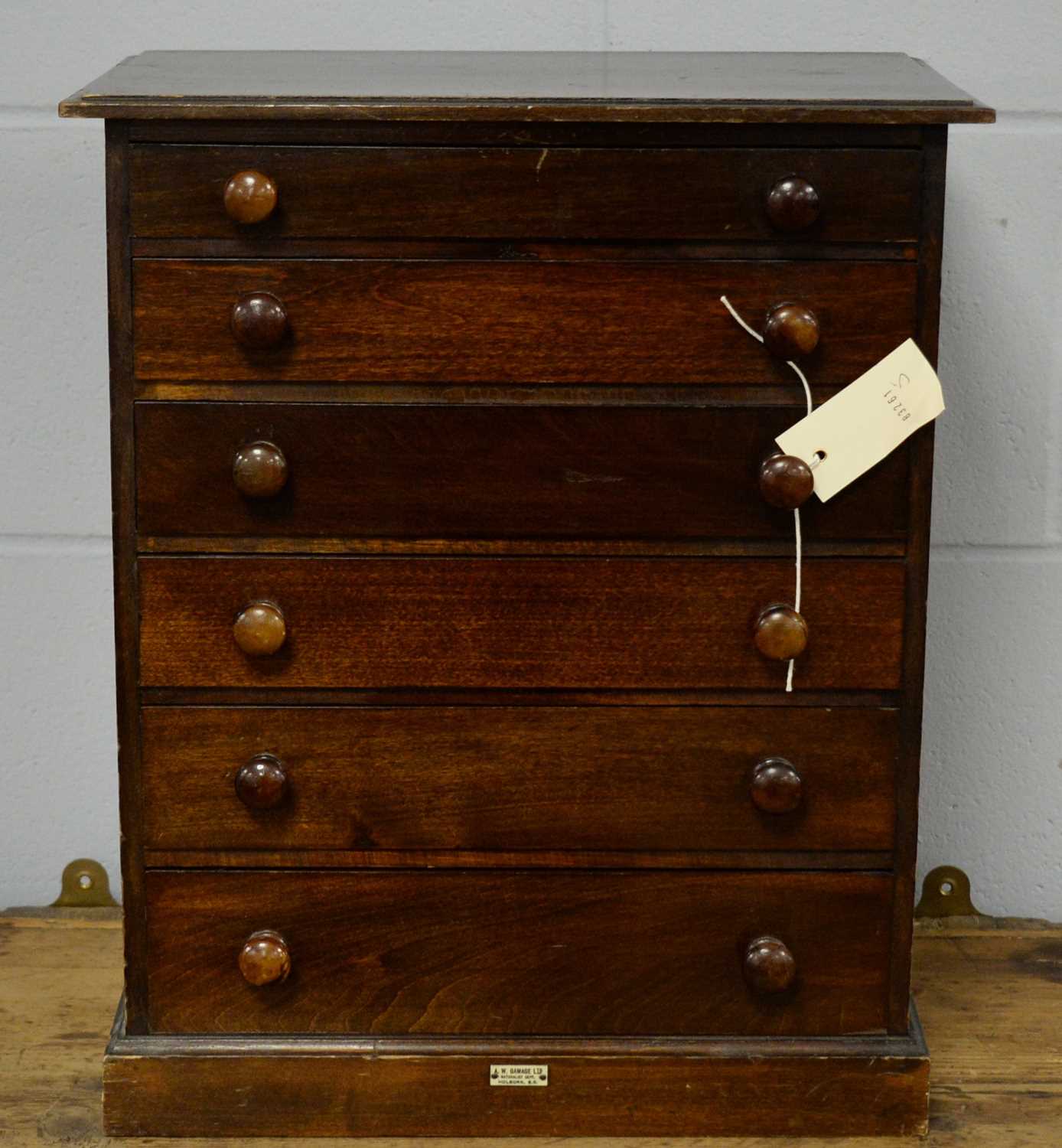 An early 20th C miniature chest of six drawers.