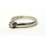 A diamond solitaire ring