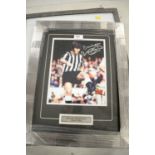 A selection of signed Newcastle United F.C. photographs.