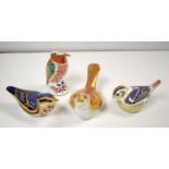Collection of four Royal Crown Derby bird paperweights.