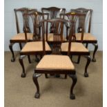 A set of six Georgian-style mahogany dining chairs.