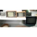 A selection of four retro televisions.