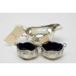 Victorian salt cellars and a George V silver sauce boat