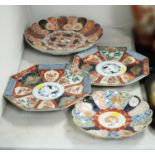 Two Imari chargers; and two Imari dishes.