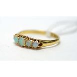 An antique five stone opal ring