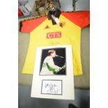 A photograph of Elton John and a Watford F.C. shirt signed by Elton John