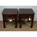 A pair of Chinese-style occasional tables.