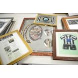 A selection of framed football memorabilia relating to Newcastle United F.C.