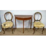 A pair of Victorian dining chairs; and a 20th C demi lune side table.
