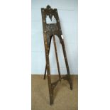 An Indo-Persian carved wood easel.