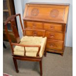 A Chinese stained hardwood bureau; and a matching stool.