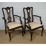 A pair of Georgian-style elbow chairs.