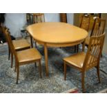 G-Plan mid-Century extending dining table and six chairs.