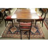 A 19th C mahogany table; and three early 19th C dining chairs.