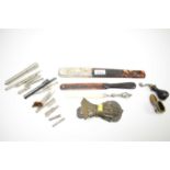 A selection of letter openers and writing accessories.