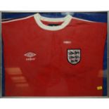 An England football shirt signed by Jack Charlton