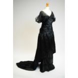 A 1910 or "Titanic Era" black silk, chiffon, and lace evening dress