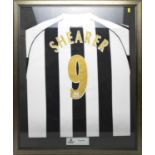 A Newcastle United signed Alan Shearer home shirt.