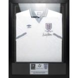 An England Italia 90 football shirt signed by Sir Bobby Robson