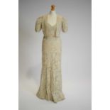 A 1930s couched cord and cream lace two-piece evening gown