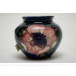 A Moorcroft vase.