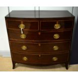 A George III mahogany and satinwood banded bowfront chest.