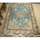 A Persian cotton rug,