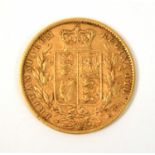 A Queen Victoria gold sovereign, 1860.