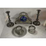 Pewter mantel clock; and other pewter items.