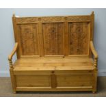A modern carved pine hall seat in the Victorian style
