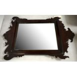 A Georgian style mahogany fretwork mirror,