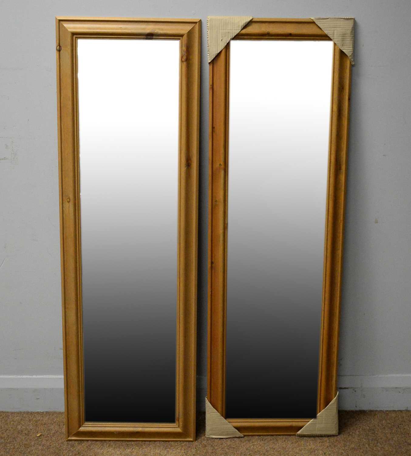 A pair of wall mirrors