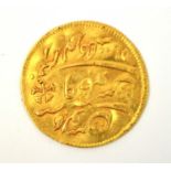 An Arabic gold coin, 5.1g.