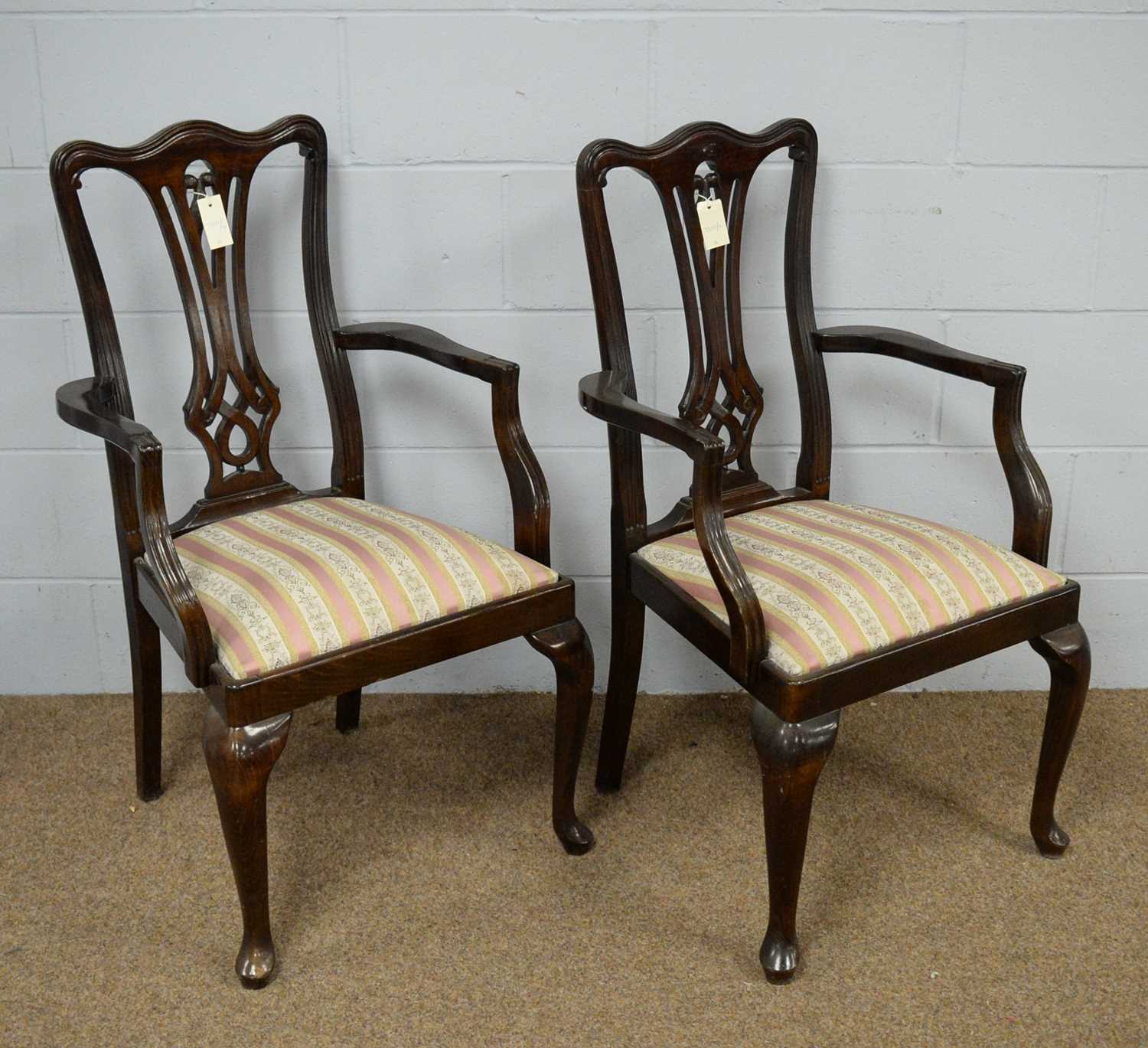 A pair of Georgian-style elbow chairs and a Regency mahogany commode chair.