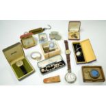 A selection of wristwatches, pocket watches, and costume jewellery.