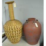 20th C wickerwork vase; and a terracotta vase.