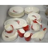 A Palissy 'Red Regatta' pattern dinner service.