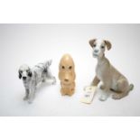 A selection of ceramic dog figures,