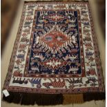 A Sumak flat woven rug,