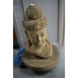 A pair of 20th Century stoneware Buddha garden sculptures.