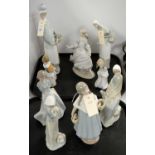 Selection of Lladro and Nao figures.