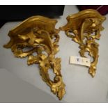 Two Italian ornate gilt wood wall sconces