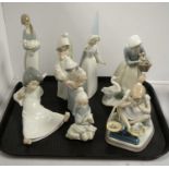 A selection of Lladro figures.