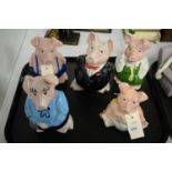 A set of NatWest Wade pig money banks.