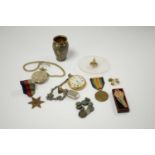 Collection of watches, medals and coinage.