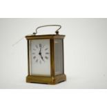 A late 19th/early 20th Century gilt metal carriage clock.