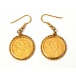 Two gold half sovereigns in earring mounts